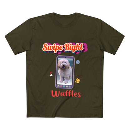 An olive green short-sleeve t-shirt with a colorful graphic print featuring the text 'Swipe Right' and 'Waffles' in red, surrounding a smartphone displaying a fluffy dog.
