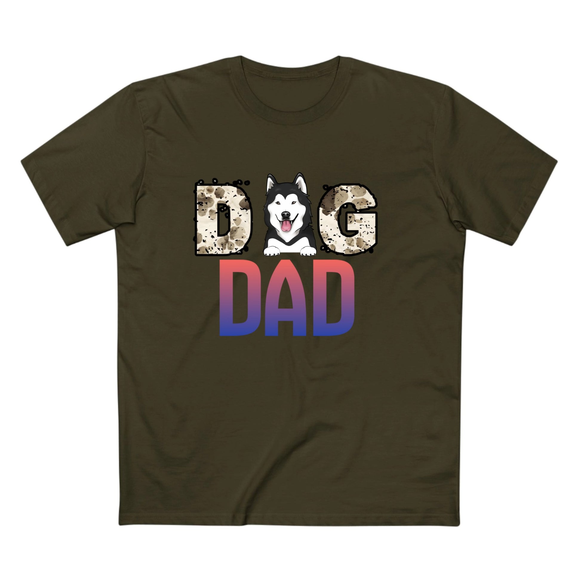 An olive green crewneck t-shirt featuring a graphic print that reads 'DOG DAD'. The letter 'O' is replaced with a cartoon husky dog head, and the letters 'D' and 'AD' below are filled with a red-to-blue gradient pattern, while 'G' has a leopard print texture.
